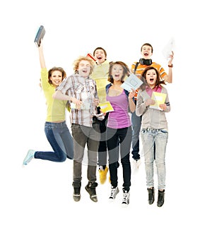 Teenagers jumping together on white