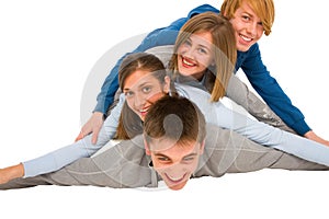 Teenagers laying in pile