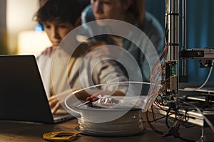 Teenagers learning 3D modeling and 3D printing