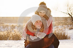 Teenagers in love. Date in winter