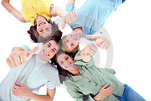 Teenagers lying down with thumbs up