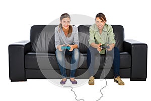 Teenagers playing with playstation photo