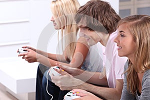 Teenagers playing video games