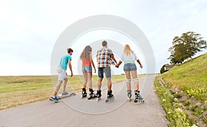 Teenagers with rollerblades and longboards