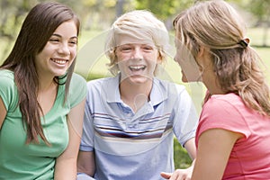 Teenagers Sitting And Conversing