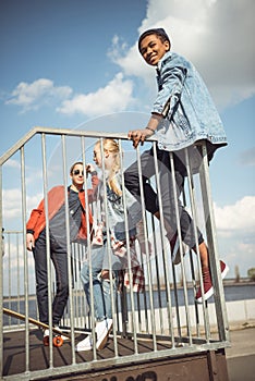 Teenagers spending time at skateboard park