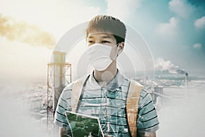 Teenagers student  wearing mask against smog  and  air pollution factory background