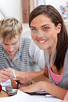 Teenagers studying in the library