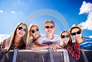 Teenagers at summer music festival, at the control barrier