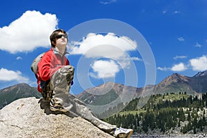 Teens boy in mountains hike