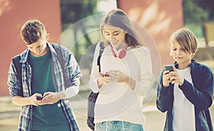 Teens burying with mobile phones