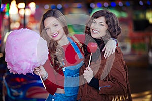 Teens at fair with candy