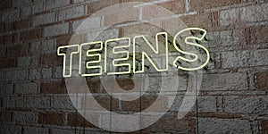 TEENS - Glowing Neon Sign on stonework wall - 3D rendered royalty free stock illustration