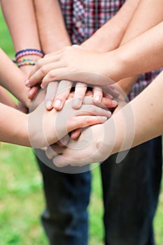 Teens' hands toghether