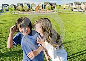 Teens having fun outside in summer