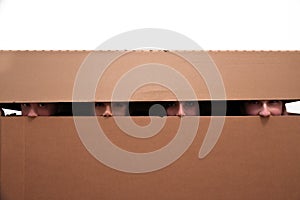Teens hidden in moving box
