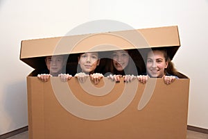 Teens hidden in moving box photo