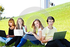 Teens with laptops