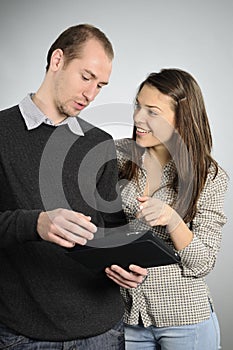 Teens learning from notebook