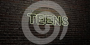 TEENS -Realistic Neon Sign on Brick Wall background - 3D rendered royalty free stock image