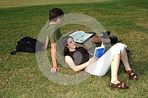 Teens studying outdoors