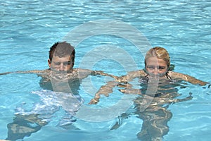 Teens swimming