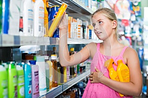 teeny holding spray and lotion of sun protection