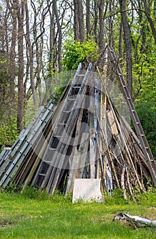 Teepee of ladders and wood