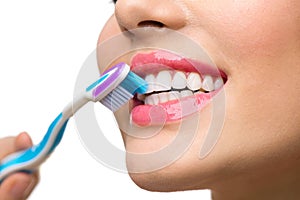 Teeth brushing. White healthy teeth