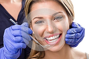 Teeth checkup at dentist photo