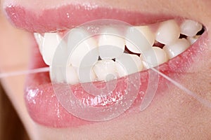 Teeth with dental floss