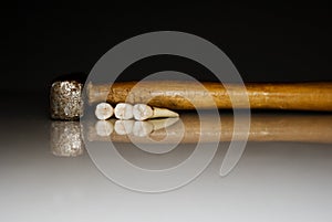 Teeth and hammer