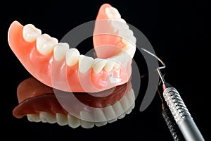 Teeth model showing an implant crown bridge model.