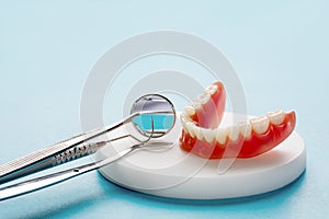 Teeth model showing an implant crown bridge model.