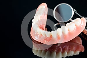 Teeth model showing an implant crown bridge model.