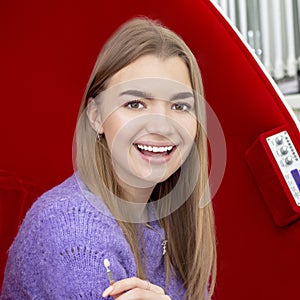 Teeth whitening girl smiling with whitened white teeth