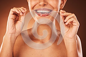 Teeth, zoom and woman with floss for dental cleaning, teeth whitening and healthy mouth protection in studio. Smile