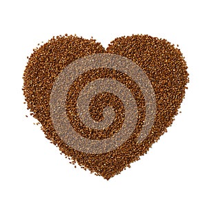 Teff seed in heart shape isolated on white background