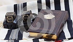 Tefillin and tallit. And a book of Jewish prayer