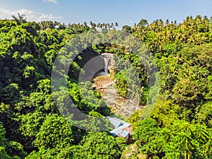 Tegenungan Waterfall near Ubud, Bali, Indonesia. Tegenungan Waterfall is a popular destination for tourists visiting