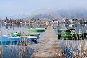 Tegernsee lake view panorama from a wooden Pier. Bayern, Germany photo