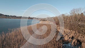 Tegernsse Lake Bavaria. Winter fpv drone flight on sunny day