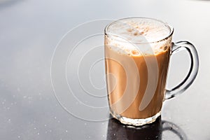 Teh tarik, milk tea with froth. Popular drink in Malaysia