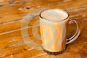 Teh tarik or pulled milk tea, popular drink in Malaysia photo