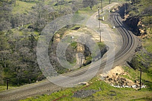 The Tehachapi Train Loop near Tehachapi California is the historic location of the Southern Pacific Railroad where freight trains photo