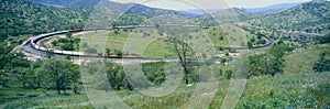 The Tehachapi Train Loop near Tehachapi California is the historic location of the Southern Pacific Railroad where freight trains photo