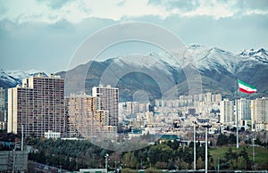 Tehran Skyline with Iran Flag and Alborz Mountains