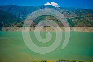 Tehri lake surrounded by mountains in Uttarakhand, india, Tehri Lake is an artificial dam reservoir. Tehri Dam, the tallest dam in