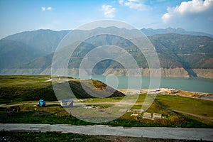 Tehri lake surrounded by mountains in Uttarakhand, india, Tehri Lake is an artificial dam reservoir. Tehri Dam, the tallest dam in