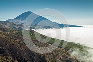 Teide volcano viewed over the clouds